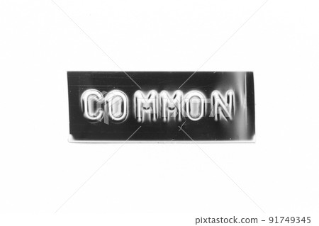 Black color banner that have embossed letter with word common on white paper background Black color banner that have embossed letter with word common on white paper background 91749345
