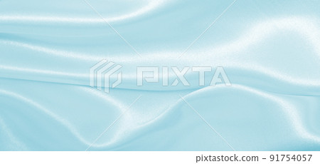 Smooth elegant blue silk or satin luxury cloth texture as abstract background. Luxurious background design Smooth elegant blue silk or satin luxury cloth texture as abstract background. Luxurious background design 91754057