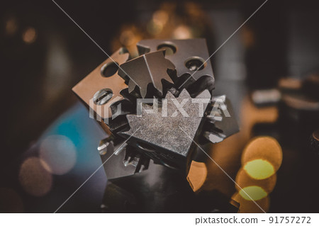 Object printed on metal 3d printer. A model created in a laser sintering machine close-up. DMLS, SLM, SLS technology. Concept of 4.0 industrial revolution. Progressive modern additive technology. 91757272