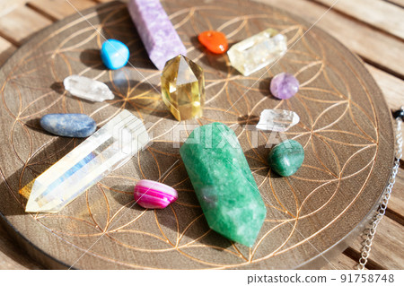 Healing crystals on brown background Healing crystals on brown background 91758748