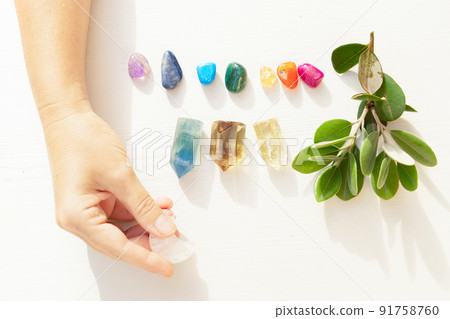 Healing crystals on brown background Healing crystals on brown background 91758760