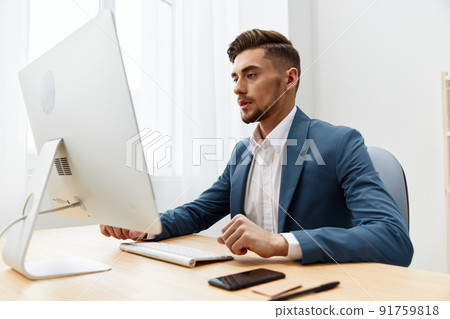 handsome businessman wearing glasses works at a computer office technologies handsome businessman wearing glasses works at a computer office technologies 91759818