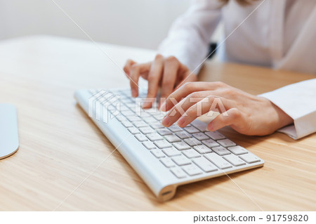 Closeup shot hands of businesswoman journalist office worker freelancer typing report doing documents on keyboard. Online communication, Remote job or Education. Copy space, wide angle Closeup shot hands of businesswoman journalist office worker freelancer typing report doing documents on keyboard. Online communication, Remote job or Education. Copy space, wide angle 91759820