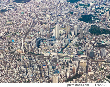 Buildings in central Tokyo seen from the cabin before landing at Haneda 91765320
