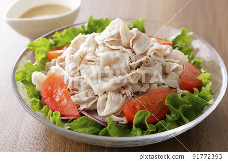 Cold shabu-shabu salad of pork roses in a glass bowl Cold shabu-shabu salad of pork roses in a glass bowl 91772393