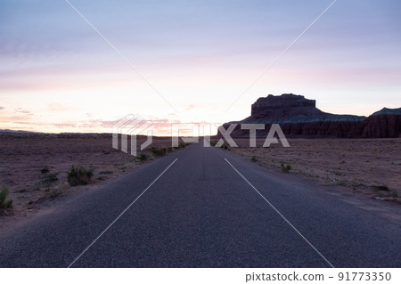 Scenic Road in Rocky Mountains in the Desert at Sunrise. Scenic Road in Rocky Mountains in the Desert at Sunrise. 91773350
