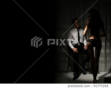 Business man sit in shadow and wait for sexy girlfriend wear lingeries to show up and seduce 91775268