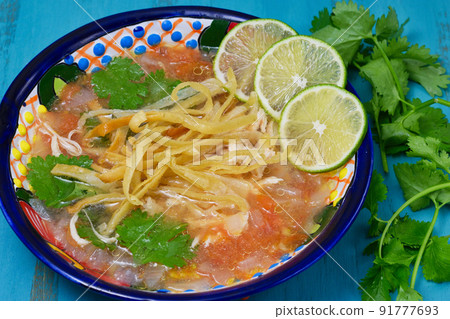 Mexican soup Sopa de Lima 91777693