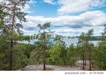 Beautiful view to the lake Pyhajarvi from mountain Hiidenvuori on island Hiidensaari, Finland Beautiful view to the lake Pyhajarvi from mountain Hiidenvuori on island Hiidensaari, Finland 91787698