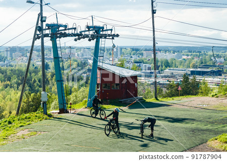 Group of mountain bikers on the hill 91787904