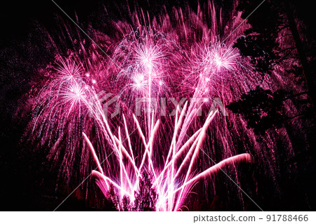 Colorful fireworks lights on the sky background at night Colorful fireworks lights on the sky background at night 91788466