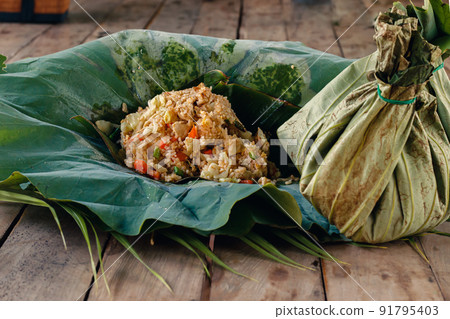 Cambodian Food Takeaway Wrapped in Eco-friendly Lotus Leaf Packaging 91795403