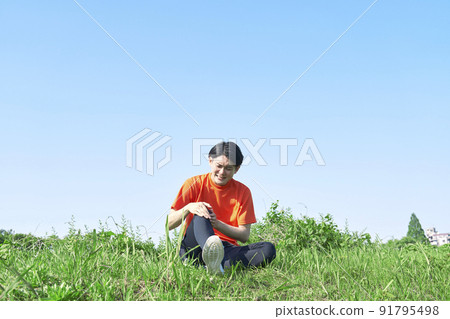 A man whose leg hurts while exercising A man whose leg hurts while exercising 91795498