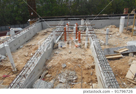 SELANGOR, MALAYSIA -JUNE 5, 2022: Toilets underground sewerage pipes installed at construction sites before floor concrete is poured. Setting out the position opening is marked by the surveyor. 91796726