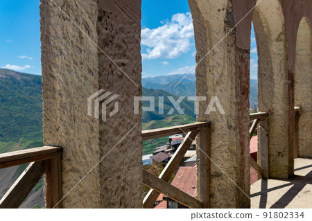 arched gallery along the facade of the house in the ancient mountain village of Chokh in Dagestan 91802334