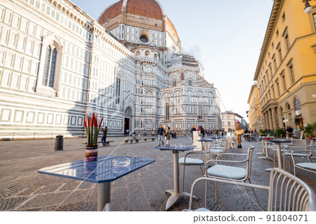 Morning view on cafe terrace on cathedral square in Florence, Italy Morning view on cafe terrace on cathedral square in Florence, Italy 91804071