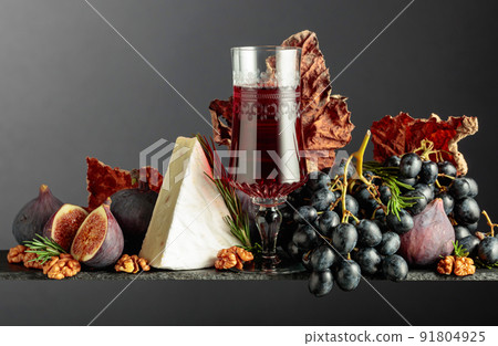 Red wine with cheese brie and fruits. Red wine with cheese brie and fruits. 91804925