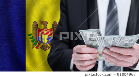 Hands holding dollar money on flag of Republica Moldova Hands holding dollar money on flag of Republica Moldova 91804965