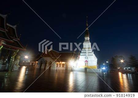 The night time at Wat Phra That Choeng Chum Worawihan It is an important sacred place of the city. since ancient times and built in the heart of the city is a precious temple located in Thailand. The night time at Wat Phra That Choeng Chum Worawihan It is an important sacred place of the city. since ancient times and built in the heart of the city is a precious temple located in Thailand. 91814919