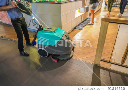 cleaning machine working on the floor. cleaning machine working on the floor. 91816310