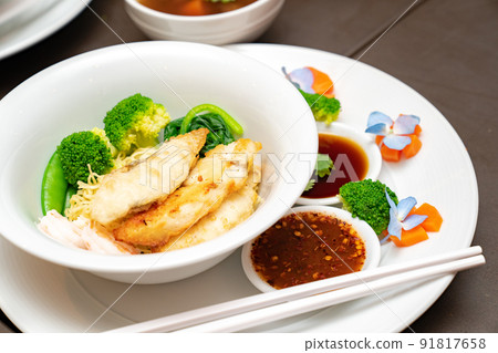 Fried fish Thai Nooble style in white bowl ready to serve and eat fot lunch or dinner. Fried fish Thai Nooble style in white bowl ready to serve and eat fot lunch or dinner. 91817658