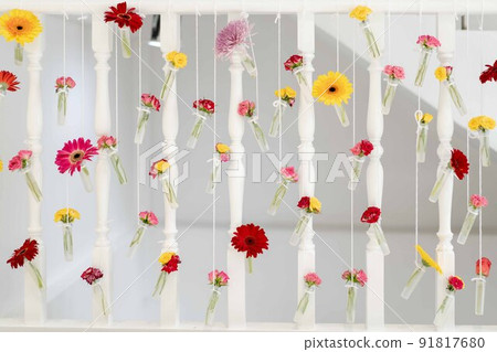 DIY beautiful flower in the little transperance glass and plastic bottle hang on to the stair terrace. 91817680