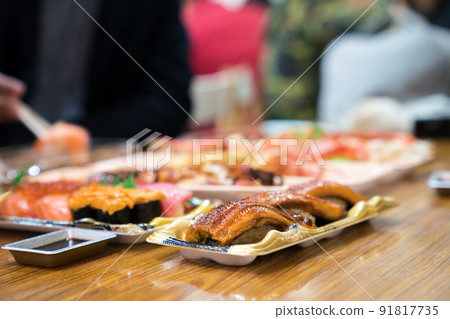 eel sushi, and others sushi; salmon, otoro, shabby, grilled shrimp, crab are arranged on the table ready to eat. eel sushi, and others sushi; salmon, otoro, shabby, grilled shrimp, crab are arranged on the table ready to eat. 91817735