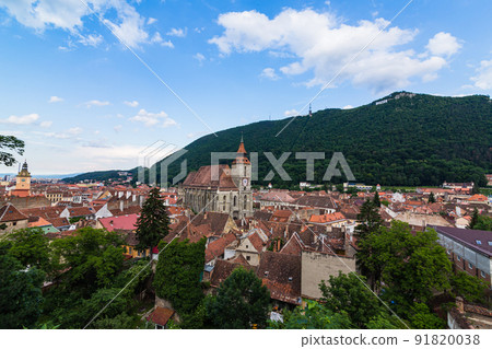 The cityscape of the old town, the black church and Mt. Tumpa seen from the black tower of Brasov in Transylvania, Romania The cityscape of the old town, the black church and Mt. Tumpa seen from the black tower of Brasov in Transylvania, Romania 91820038