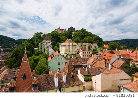 The mountain of the school seen from the observation deck of the clock tower in the historical district of Sighisoara in Transylvania, Romania 91820381
