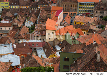 Cityscape from the observation deck of the clock tower in the historical district of Sighisoara in Transylvania, Romania Cityscape from the observation deck of the clock tower in the historical district of Sighisoara in Transylvania, Romania 91820385