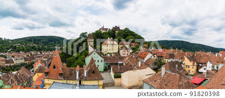 The mountain of the school seen from the observation deck of the clock tower in the historical district of Sighisoara in Transylvania, Romania 91820398