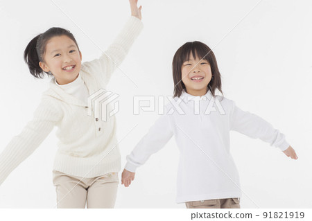 Siblings playing with open hands 91821919