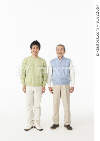 Portrait of smiling senior man and son 91822067
