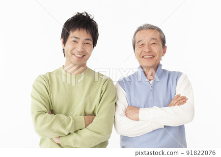 Portrait of smiling senior man and son 91822076