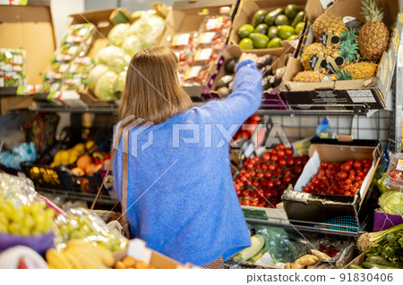 Woman shopping food at market 91830406