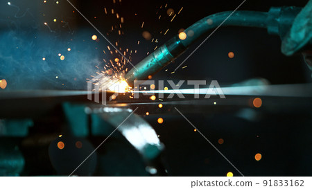 Welder welding technical steel, detail shot. 91833162