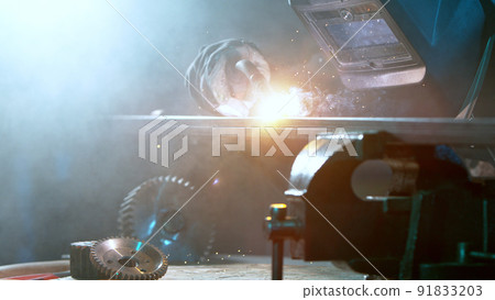 Welder welding technical steel, detail shot. Welder welding technical steel, detail shot. 91833203