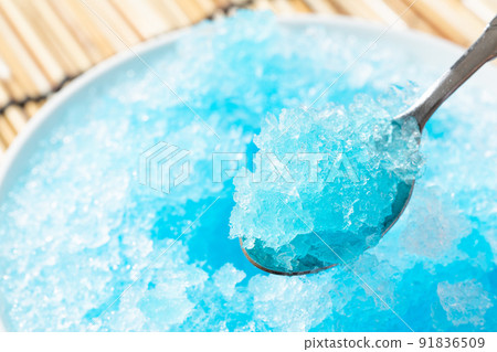 Shaved ice with blue syrup 91836509