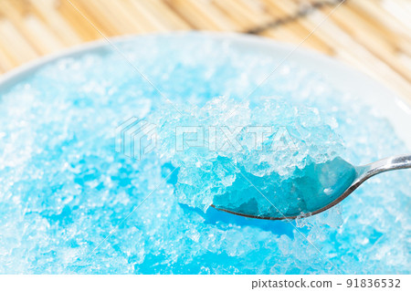 Shaved ice with blue syrup 91836532