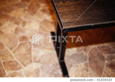 It seems to hurt if you hit the corner of the table that is common in restaurants 91836583