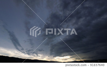 Summer morning sky covered with dark clouds due to approaching low pressure, super wide angle, 220626am, sky main Summer morning sky covered with dark clouds due to approaching low pressure, super wide angle, 220626am, sky main 91837640