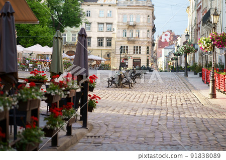 Traditional houses on a pedestrian street in the historic Old Town of Lviv, Ukraine. May 2021 91838089