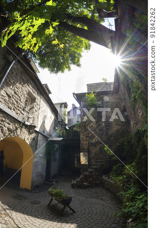 Old courtyard in the center of Tallinn, Estonia 91842262