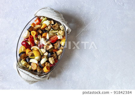 Baking dish with vegetables ready to bake Baking dish with vegetables ready to bake 91842384
