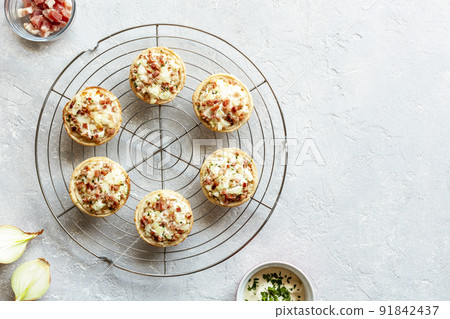 Flammekueche, french region Alsace specialty preparation, top view 91842437