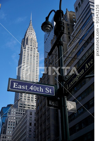 Looking up at the Chrysler Building from Midtown 91843258