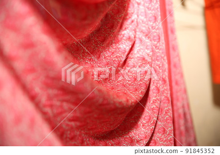Isolated shots of freeze motion of red satin. Isolated shots of freeze motion of red satin. 91845352