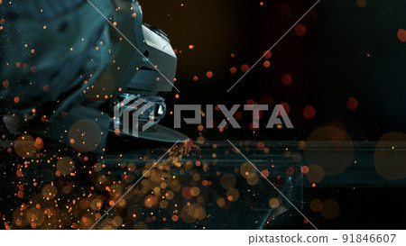 Working Metal Cutter in Workshop. Detail shot, low depth of focus. 91846607