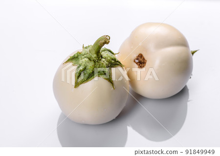Fresh white eggplant ripped from the garden by the house 91849949