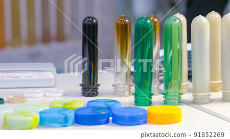 Collection of various colorful test tubes and caps. 91852269
